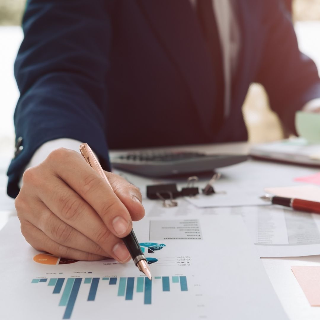 Businessman collecting financial documents