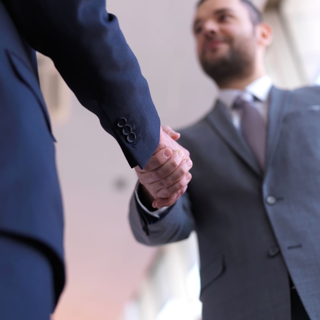 Two businessmen shaking hands